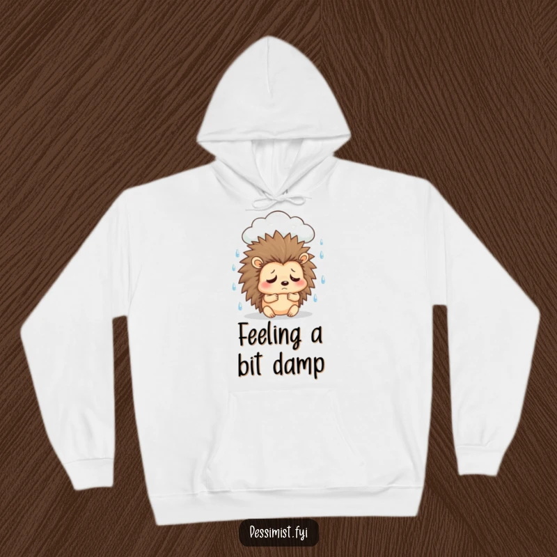Funny sad hedgehog hoodie depicting a character under a rain cloud, sighing, offering cozy comfort and relatable humor.