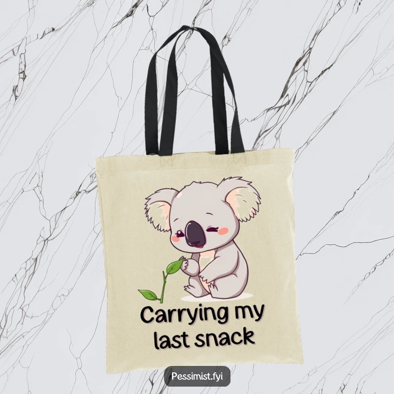 Funny koala tote bag showing a cute character looking down with concern at a single, wilting leaf, perfect for eco-conscious carry-alls.
